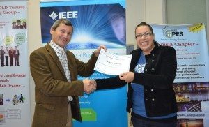Tunisia IEEE YP AG Chairwoman Chiraz Walha presents a certificate of appreciation to Prof. Bruno Meyer