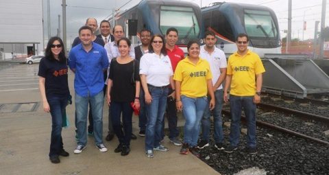 IEEE Young Professionals on tracks in front a train at Panama Metro Train