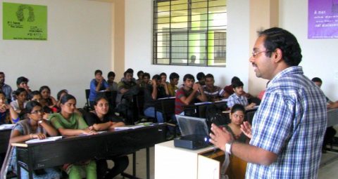 Photo of Mr. Sudhir Rao Rupanagudi speaking to a room full of students