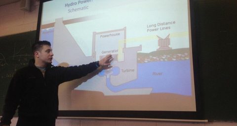 Photo of Dr. Anthony Deese explaining Hydro Power
